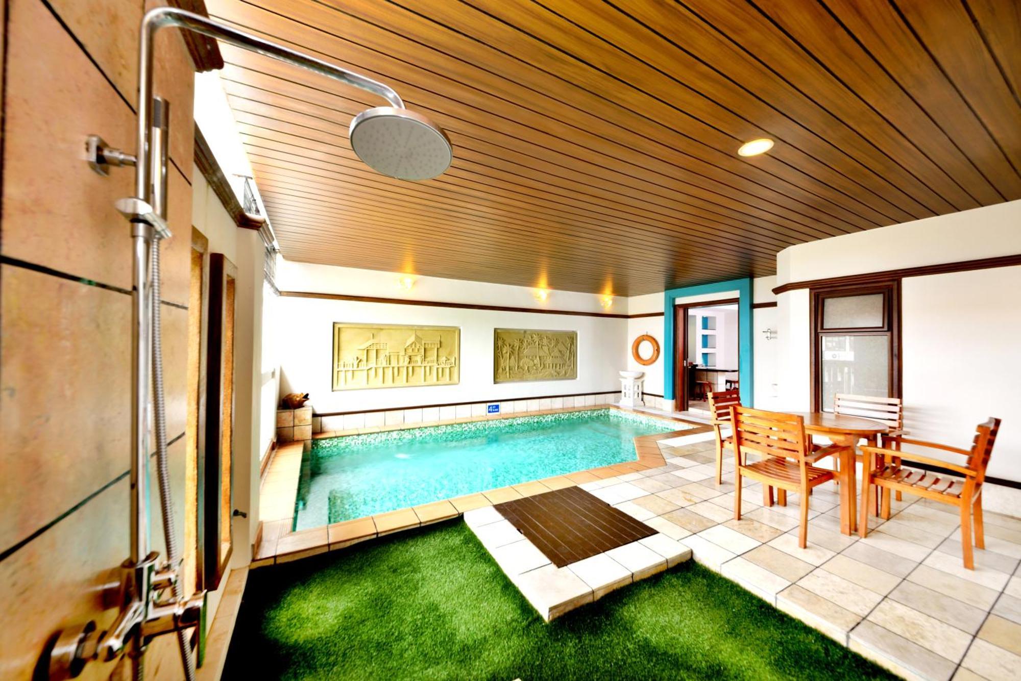 Отель Grand Lexis Порт-Диксон Экстерьер фото A private onsen in a hotel